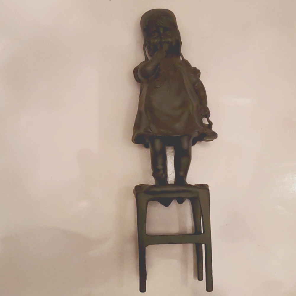 12 inch wrought-iron statue of girl